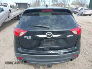 2014 Mazda CX-5 Sport with VIN JM3KE4BE4E0426931, listed as a IAAI auction lot 42055582 with 121,418 mi miles. Bid and sale history available at carsss.com. Image 16.
