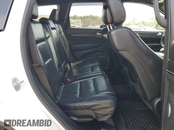 2018 Jeep Grand Cherokee High Altitude z VIN 1C4RJFCG6JC135953, wystawiony jako Copart lot #51330095 z przebiegiem 102 079 mil mil oraz Szkoda całkowita • Salvage title. Historia ofert i sprzedaży dostępna na DreamBid. Obrazek 11.