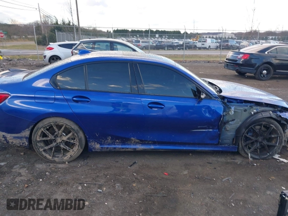 2020 BMW 3 Series M340i xDrive with VIN WBA5U9C00LFH03223, listed as a IAAI auction lot 41020498 with 58,775 mi miles and . Bid and sale history available at DreamBid. Image 13.