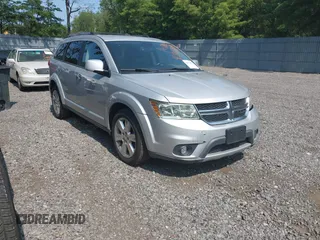 2014 Dodge Journey R/T with VIN 3C4PDDFG9ET257392, listed as a IAAI auction lot 42867419 with 163,833 mi miles and . Bid and sale history available at DreamBid. Image 1.