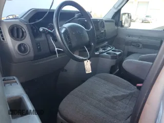 2010 Ford Econoline Passenger XL with VIN 1FMNE1BW3ADA25124, listed as a Copart auction lot 56899235 with 244,010 mi miles and Salvage title. Bid and sale history available at DreamBid. Image 8.