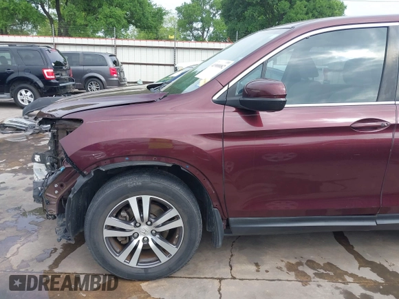 2016 Honda Pilot EX with VIN 5FNYF5H30GB026736, listed as a IAAI auction lot 41900082 with 144,460 mi miles. Bid and sale history available at carsss.com. Image 20.