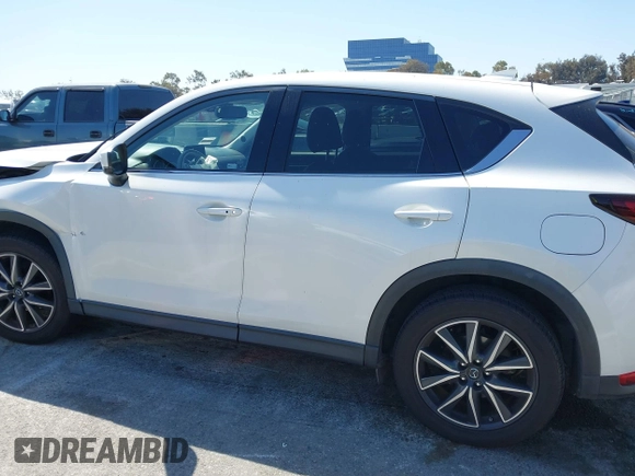 2018 Mazda CX-5 Grand Touring with VIN JM3KFADM8J0373368, listed as a IAAI auction lot 42013535 with 63,142 mi miles and . Bid and sale history available at DreamBid. Image 14.