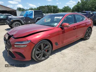 2023 Genesis G70 3.3T with VIN KMTG54TE0PU114499, listed as a Copart auction lot 56957995 with 50,469 mi miles and Salvage title. Bid and sale history available at DreamBid. Image 1.