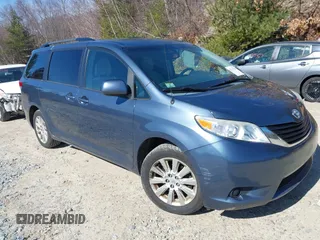 2014 Toyota Sienna LE with VIN 5TDJK3DC4ES087457, listed as a IAAI auction lot 41773128 with 103,993 mi miles. Bid and sale history available at carsss.com. Image 1.