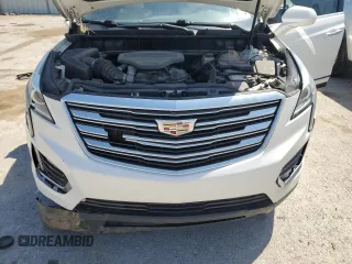 2017 Cadillac XT5 FWD z VIN 1GYKNARS3HZ297366, wystawiony jako Copart lot #53908815 z przebiegiem 95 834 mil mil oraz Szkoda całkowita • Salvage title. Historia ofert i sprzedaży dostępna na DreamBid. Obrazek 12.