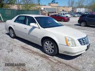 2008 Cadillac DTS 1SC with VIN 1G6KD57Y78U146005, listed as a IAAI auction lot 41982953 with 179,763 mi miles and . Bid and sale history available at carsss.com. Image 1.