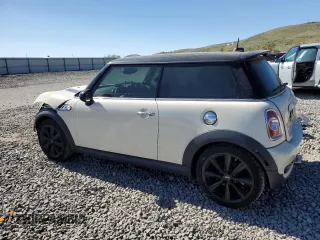 2013 MINI Hardtop S with VIN WMWSV3C52DT389468, listed as a Copart auction lot 57293845 with 84,723 mi miles and Salvage title. Bid and sale history available at DreamBid. Image 2.