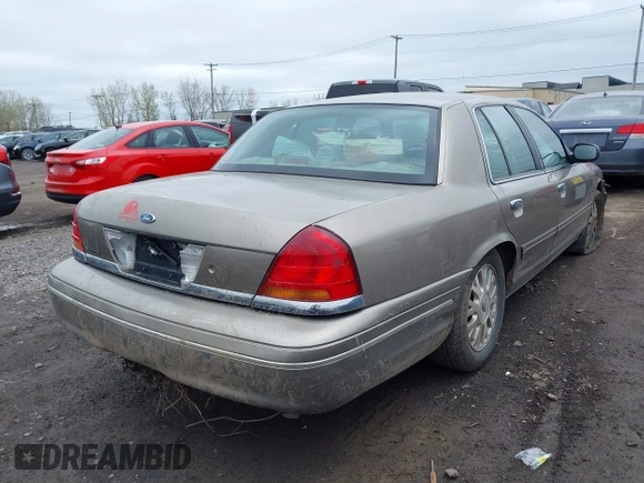 2003 Ford Crown Victoria LX z VIN 2FAFP74W13X120754, wystawiony jako IAAI lot #42212879 z przebiegiem 91 438 mil mil oraz . Historia ofert i sprzedaży dostępna na DreamBid. Obrazek 4.