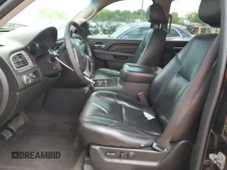 2011 GMC Yukon Denali z VIN 1GKS2EEF2BR308951, wystawiony jako Copart lot #57052825 z przebiegiem 217 895 mil mil oraz Tytuł czysty. Historia ofert i sprzedaży dostępna na DreamBid. Obrazek 7.