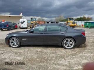 2014 BMW 7 Series 740Li with VIN WBAYE4C56ED138397, listed as a IAAI auction lot 41726117 with 116,291 mi miles. Bid and sale history available at carsss.com. Image 14.