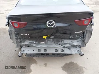 2021 Mazda 3 Premium with VIN JM1BPADL4M1329041, listed as a IAAI auction lot 42291604 with 93,248 mi miles and . Bid and sale history available at DreamBid. Image 6.