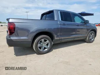 2023 Honda Ridgeline RTL z VIN 5FPYK3F5XPB025508, wystawiony jako Copart lot #64200695 z przebiegiem 3 913 mil mil oraz Szkoda całkowita • Salvage title. Historia ofert i sprzedaży dostępna na DreamBid. Obrazek 3.