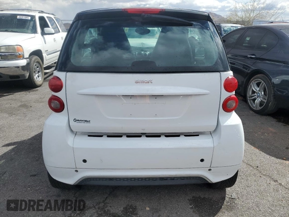 2015 Smart fortwo Passion z VIN WMEEJ3BA5FK812094, wystawiony jako Copart lot #48247405 z przebiegiem 79 913 mil mil oraz Szkody całkowita. Historia ofert i sprzedaży dostępna na DreamBid. Obrazek 6.