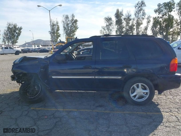 2007 GMC Envoy SLE with VIN 1GKDS13S072127977, listed as a IAAI auction lot 41119560 with 136,291 mi miles. Bid and sale history available at carsss.com. Image 14.