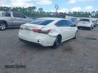 2015 Toyota Avalon Limited with VIN 4T1BK1EB3FU174984, listed as a IAAI auction lot 42155795 with 83,963 mi miles and . Bid and sale history available at DreamBid. Image 4.