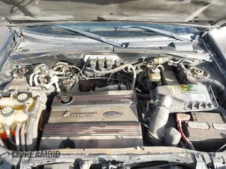 2005 Ford Escape Hybrid with VIN 1FMCU96H45KD29925, listed as a IAAI auction lot 41346475 with 209,922 mi miles. Bid and sale history available at carsss.com. Image 10.