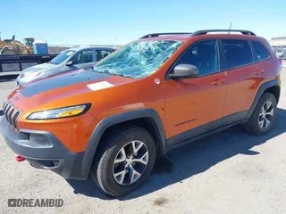 2016 Jeep Cherokee Trailhawk with VIN 1C4PJMBS8GW176464, listed as a IAAI auction lot 41656518 with 63,724 mi miles. Bid and sale history available at carsss.com. Image 17.