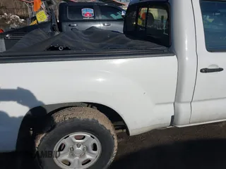 2014 Toyota Tacoma with VIN 5TFNX4CN0EX032686, listed as a IAAI auction lot 41435281 with 84,425 mi miles and . Bid and sale history available at DreamBid. Image 8.