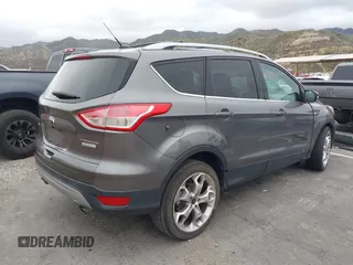2013 Ford Escape Titanium with VIN 1FMCU0J95DUC71130, listed as a IAAI auction lot 42072032 with 144,054 mi miles and . Bid and sale history available at carsss.com. Image 4.