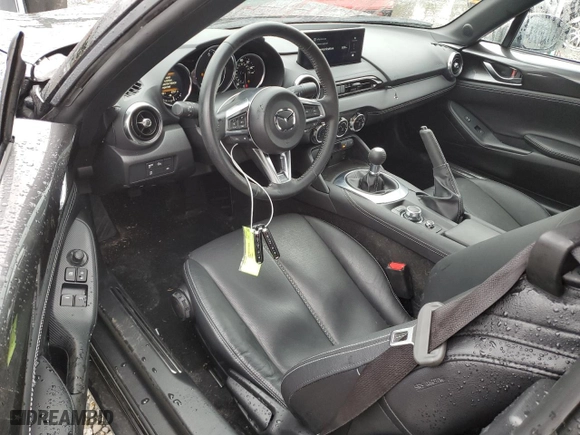 2024 Mazda MX-5 Miata Grand Touring with VIN JM1NDAD78R0602844, listed as a Copart auction lot 50199785 with 4,257 mi miles and Salvage Title. Bid and sale history available at carsss.com. Image 8.