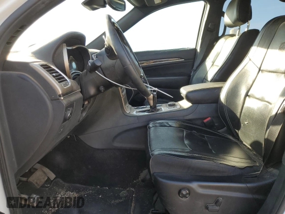 2017 Jeep Grand Cherokee Overland with VIN 1C4RJFCG2HC834328, listed as a Copart auction lot 78094644 with 86,706 mi miles and Salvage Title. Bid and sale history available at carsss.com. Image 7.