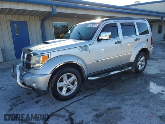 2007 Dodge Nitro SLT with VIN 1D8GT58K57W503007, listed as a Copart auction lot 87694345 with 146,832 mi miles and Salvage Title. Bid and sale history available at DreamBid. Image 1.