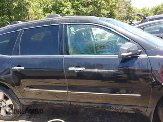2015 Chevrolet Traverse LTZ with VIN 1GNKVJKDXFJ279029, listed as a IAAI auction lot 39694033 with 151,241 mi miles and . Bid and sale history available at DreamBid. Image 13.