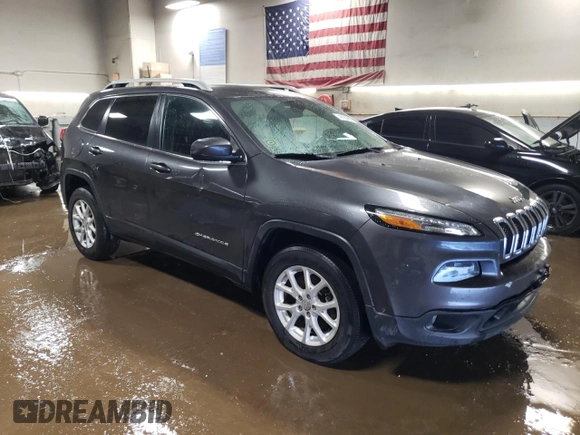 2016 Jeep Cherokee Latitude with VIN 1C4PJMCBXGW242415, listed as a Copart auction lot 48760805 with 139,039 mi miles and Salvage Title. Bid and sale history available at DreamBid. Image 4.