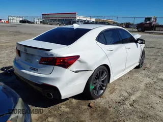 2019 Acura TLX w/A-Spec Pkg with VIN 19UUB1F67KA003246, listed as a IAAI auction lot 41741567 with 103,478 mi miles. Bid and sale history available at carsss.com. Image 4.