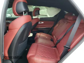 2023 Genesis GV70 Sport z VIN KMUMCDTC7PU102031, wystawiony jako Copart lot #55354305 z przebiegiem Nie podano mil oraz Szkoda całkowita • Salvage title. Historia ofert i sprzedaży dostępna na DreamBid. Obrazek 10.