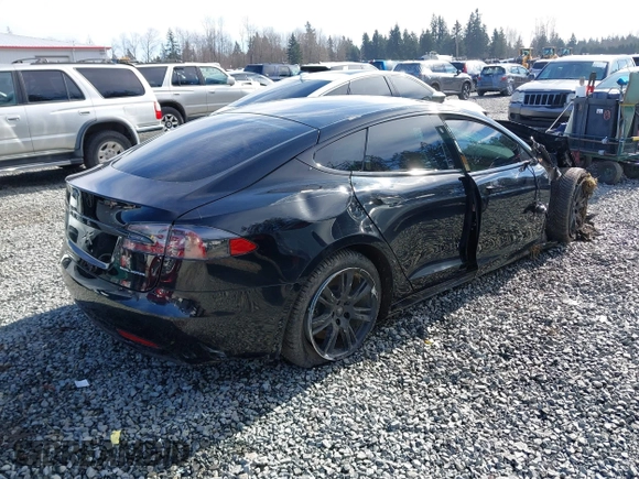 2021 Tesla Model S Long Range Plus z VIN 5YJSA1E24MF426299, wystawiony jako IAAI lot #41673498 z przebiegiem 102 035 mil mil oraz . Historia ofert i sprzedaży dostępna na DreamBid. Obrazek 4.