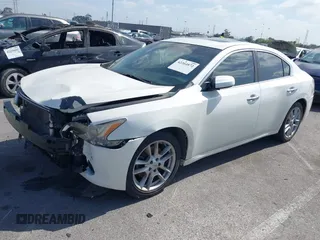 2014 Nissan Maxima S with VIN 1N4AA5AP7EC460858, listed as a IAAI auction lot 42264872 with 131,138 mi miles and . Bid and sale history available at DreamBid. Image 2.