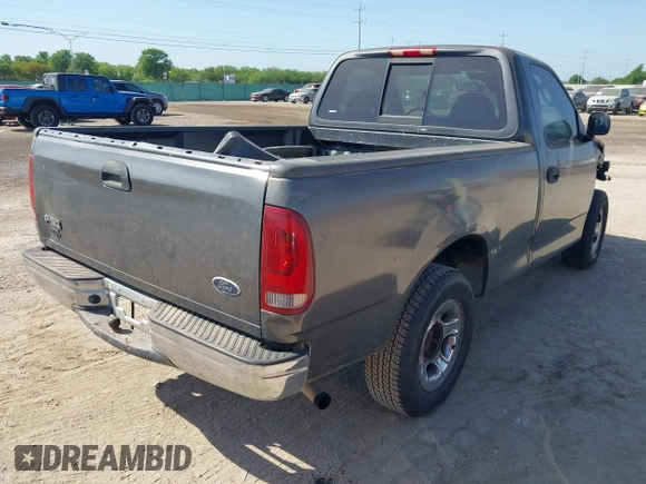 2003 Ford F-150 XL with VIN 1FTRF17273NB64646, listed as a IAAI auction lot 41986850 with 180,601 mi miles and . Bid and sale history available at DreamBid. Image 4.