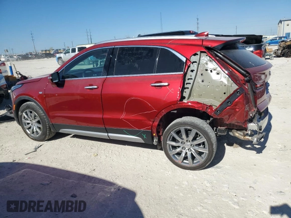 2022 Cadillac XT4 FWD Premium Luxury with VIN 1GYFZCR43NF154997, listed as a Copart auction lot 81942214 with 22,697 mi miles and Salvage title. Bid and sale history available at DreamBid. Image 2.