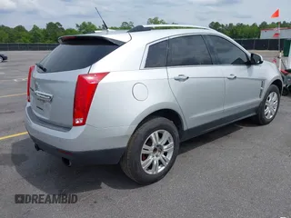 2011 Cadillac SRX Luxury Collection with VIN 3GYFNAEY5BS563048, listed as a IAAI auction lot 42031973 with 182,047 mi miles and . Bid and sale history available at DreamBid. Image 4.