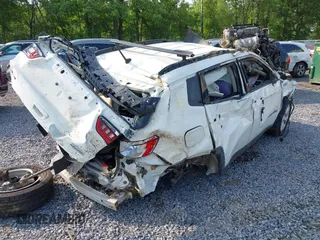 2018 Jeep Compass Latitude with VIN 3C4NJDBB4JT270975, listed as a IAAI auction lot 42477582 with 98,629 mi miles and . Bid and sale history available at DreamBid. Image 4.