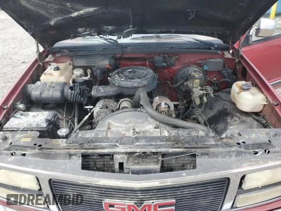 1990 GMC Sierra 1500 z VIN 1GTFC24K8LE514419, wystawiony jako Copart lot #57265335 z przebiegiem 162 045 mil mil oraz Szkoda całkowita • Salvage title. Historia ofert i sprzedaży dostępna na DreamBid. Obrazek 11.