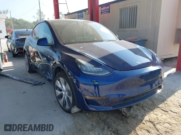 2022 Tesla Model Y Long Range z VIN 7SAYGAEE2NF364733, wystawiony jako IAAI lot #42290231 z przebiegiem 33 907 mil mil oraz . Historia ofert i sprzedaży dostępna na DreamBid. Obrazek 1.