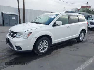 2015 Dodge Journey SXT with VIN 3C4PDDBG9FT600712, listed as a IAAI auction lot 42090741 with 111,741 mi miles and . Bid and sale history available at DreamBid. Image 17.