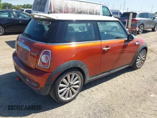2012 MINI Hardtop S with VIN WMWSV3C56CTY26211, listed as a IAAI auction lot 41969590 with 111,299 mi miles and . Bid and sale history available at DreamBid. Image 4.