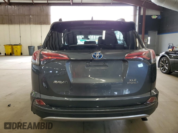 2016 Toyota RAV4 Hybrid XLE with VIN JTMRJREV0GD035203, listed as a Copart auction lot 54300225 with 153,369 mi miles and Salvage Title. Bid and sale history available at carsss.com. Image 6.