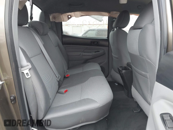 2015 Toyota Tacoma with VIN 3TMLU4EN8FM198605, listed as a IAAI auction lot 42039238 with 132,109 mi miles and . Bid and sale history available at DreamBid. Image 8.