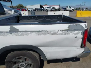 1999 Nissan Frontier XE with VIN 1N6DD26S1XC324221, listed as a IAAI auction lot 42814722 with 308,599 mi miles and . Bid and sale history available at DreamBid. Image 6.