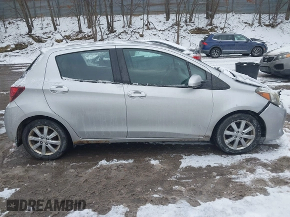 2015 Toyota Yaris L with VIN VNKKTUD32FA017551, listed as a IAAI auction lot 41267892 with 122,506 mi miles. Bid and sale history available at carsss.com. Image 14.