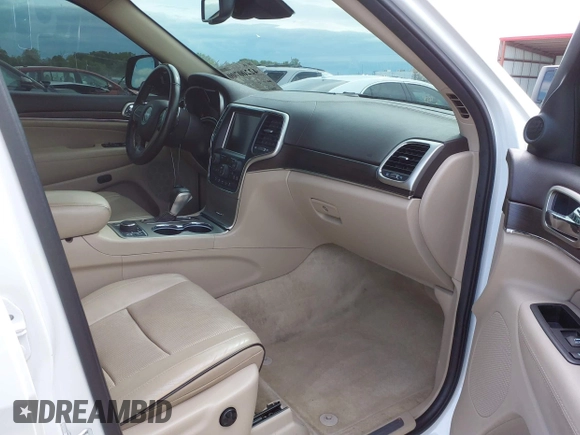 2016 Jeep Grand Cherokee Overland with VIN 1C4RJFCG2GC490420, listed as a IAAI auction lot 42200700 with 97,007 mi miles and . Bid and sale history available at DreamBid. Image 5.