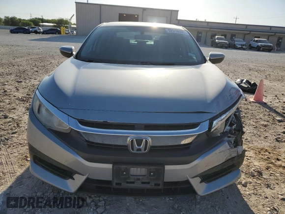 2017 Honda Civic LX z VIN 19XFC2F50HE032708, wystawiony jako Copart lot #52510535 z przebiegiem 83 467 mil mil oraz Szkoda całkowita • Salvage title. Historia ofert i sprzedaży dostępna na DreamBid. Obrazek 5.