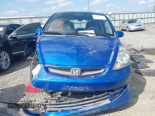2007 Honda Fit Sport with VIN JHMGD386X7S029838, listed as a IAAI auction lot 41942513 with 141,612 mi miles. Bid and sale history available at carsss.com. Image 12.