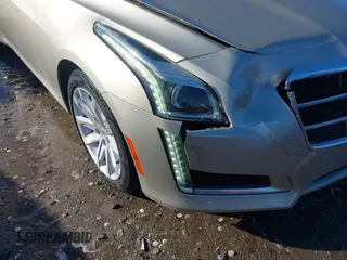 2014 Cadillac CTS Sedan RWD with VIN 1G6AP5SX8E0184038, listed as a IAAI auction lot 41235258 with 107,420 mi miles. Bid and sale history available at carsss.com. Image 6.