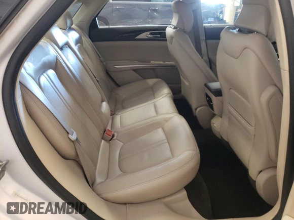 2016 Lincoln MKZ z VIN 3LN6L2GK6GR624511, wystawiony jako Copart lot #56137625 z przebiegiem 88 289 mil mil oraz Szkoda całkowita • Salvage title. Historia ofert i sprzedaży dostępna na DreamBid. Obrazek 10.